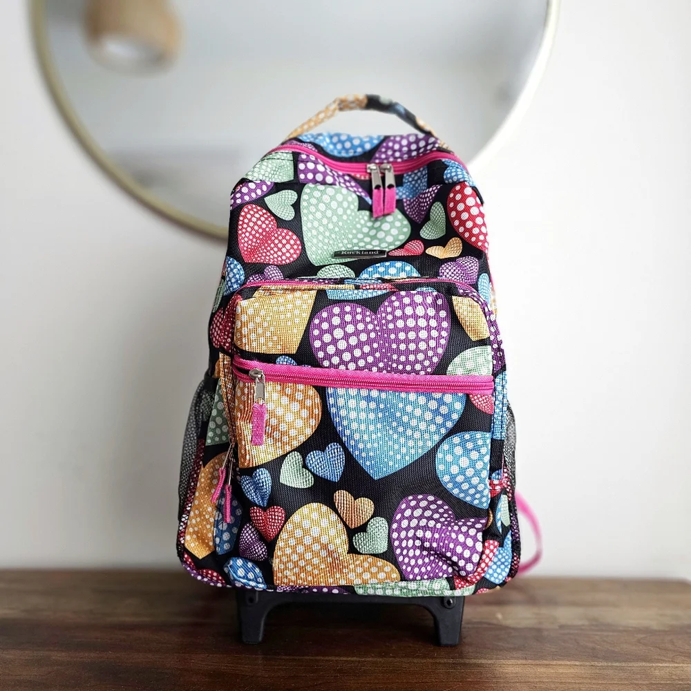Rockland Rolling Backpack School Bag Travel Luggage Mesh Pockets New Heart 17″